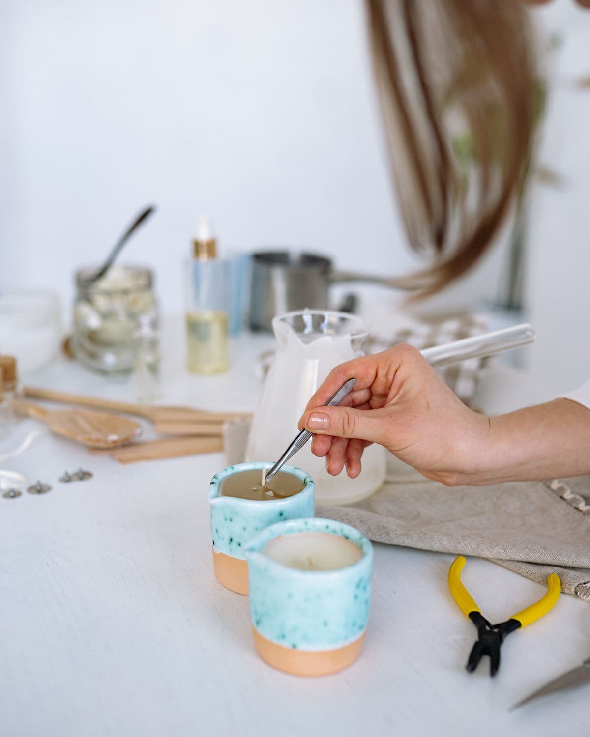 Hand-pouring a candle at the Shrisha's Aura studio